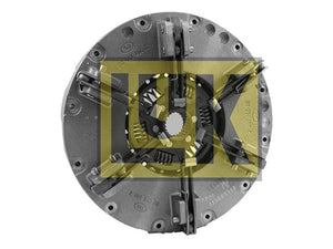 Close-up of a mechanical component, possibly the Clutch Cover Assembly (Sparex Part Number: S.73098) by Sparex, with metal springs and bolts visible, featuring a yellow grid overlay.