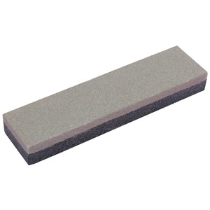 The Draper Silicone Carbide Sharpening Stone, 100 X 25 X 12mm - 1004/1 features medium sharpening surfaces with a coarse gray side and a finer pink side.