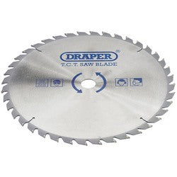 A circular saw blade under the brand "Draper" with the name "Flywheel" printed on it. It is silver with several sharp teeth around its edge.