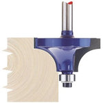 Close-up of the Draper Tct Router Bit, 1/4" Beading, 38 X 20mm - RB10 creating a dovetail cut pattern on a piece of wood.