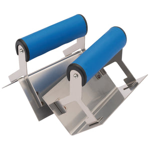 The Draper Soft Grip Corner Trowel Set (2 Piece) - CTS/2PCW features two stainless steel trowels with blue, soft grip handles and durable carbon steel blades, displayed to show both the front and side views—perfect for plastering corners.