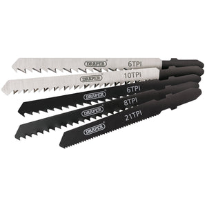 Five Draper Assorted Jigsaw Blades from the JSBCOM5 set are arranged in a row, each marked with different TPI (Teeth Per Inch) values: 6, 10, 6, 8, and 21. This versatile cutting set features alternating silver and black colors and is ideal for tackling plastics as well as softwoods and hardwoods.