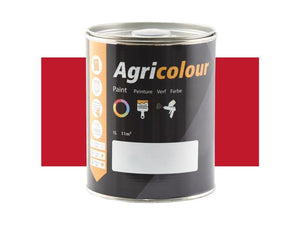 A 1-liter tin of Sparex Paint - Agricolour Gloss, part number S.82579, featuring a black label with icons and text indicating its use on metal surfaces. The can is centered in front of a red rectangle background.