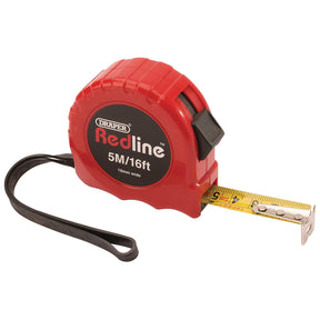 A measuring tape labeled "Draper Redline Metric/Imperial Measuring Tape, 5M/16Ft - RL-MT-CL2," featuring a length of 5 meters (16 feet) with a black wrist strap attached and an ABS plastic case for durability.