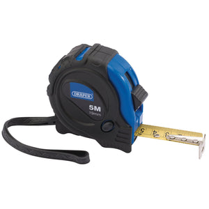 The Draper Measuring Tapes, 5M/16Ft x 19mm - EMTGD/12, boasts a blue and black impact-resistant ABS case. Its 19mm wide yellow steel blade extends smoothly, and it features a convenient black wrist strap for ease of use. Accurate measurements are guaranteed with this durable tool.