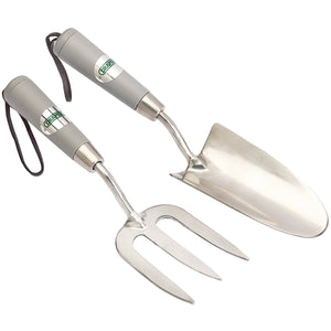 The Draper Stainless Steel Hand Fork and Trowel Set (2 Piece) - GSFT2/I features a sleek silver hand trowel and a durable stainless steel weeding fork, both with grey handles. Each tool is adorned with the Draper logo on the handle and includes a wrist strap. Presented on a pristine white background, this elegant gift set is perfect for gardening enthusiasts.