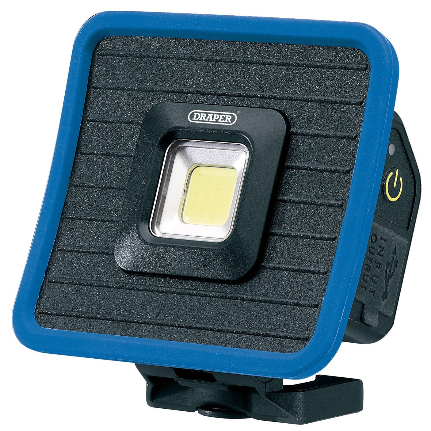 A Draper Cob Led Rechargeable Mini Flood Light and Power Bank (RMFL/1000), with a 10W COB LED delivering 1000 Lumens, featuring a square-shaped blue frame, black ribbed front, side power button, "Draper" branding in the center, magnetic base and hanging hook. Comes with a USB-C cable.