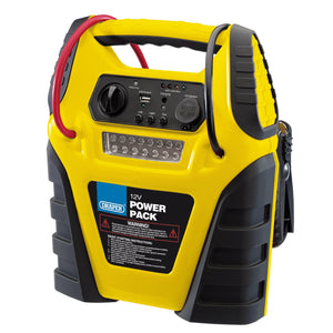 Introducing the Draper 12V Power Pack - PP12V17Y, a yellow and black powerhouse featuring cables, an LED light, and a control panel that includes a voltmeter and various switches. This versatile booster is perfect for all your emergency power needs.