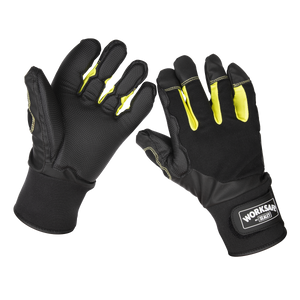 Pair of Sealey Anti-Vibration Gloves (Large, 9142L) in black with yellow accents, featuring reinforced fingertips and a Sealey brand logo on the wrist strap. Made with breathable fabric, these gloves provide comfort during long hours of use.