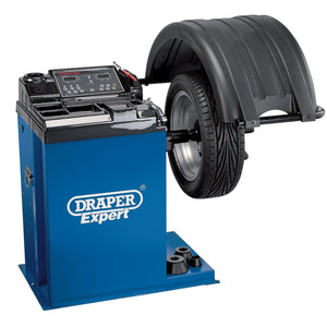 A Draper Semi Automatic Wheel Balancer - WB200 with a single mounted tire and wheel assembly. The machine, branded by Draper, features a digital interface for precise static balancing and boasts a blue and black color scheme.