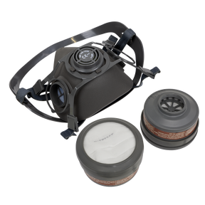 A black Sealey Half Mask with A1P2R Filter Cartridges - 9360/61, featuring lightweight construction, adjustable straps, and two detachable filters, is displayed on a white background.