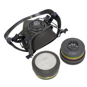 A Sealey Half Mask with ABEK1 P2R Filter Cartridges (model 9360/63), lightweight and black with adjustable straps, is shown alongside two replaceable filter cartridges.