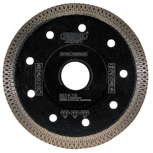 The Draper Expert Turbo-X Porcelain Diamond Blade, 115mm - DBX1, is a black circular saw blade with a continuous turbo-x rim and textured edge. It features various white symbols and text, including the "Draper Expert" brand. The center has a circular hole for mounting, making it ideal for tile cutting tasks.