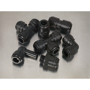 A collection of high-quality components, including the Sealey Speedfit® Coupling Assortment 20pc Ø10mm Metric - AB070JG, featuring black plastic pipe fittings, elbows, straight connectors, and pneumatic couplings, arranged on a gray surface.