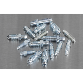 A meticulously arranged assortment of Sealey Bleed Nipple Assortment 160pc (AB160BN) metallic brake bleeder screws, featuring various sizes including metric options, displayed on a flat surface.
