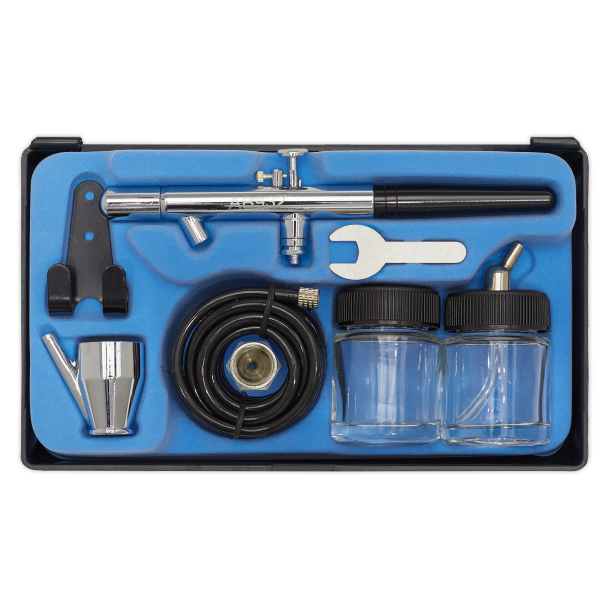 The Sealey Air Brush Kit Professional without Propellant (AB932) includes a 0.35mm nozzle, metal body, hose, wrench, and two glass jars all neatly organized in a blue foam case.