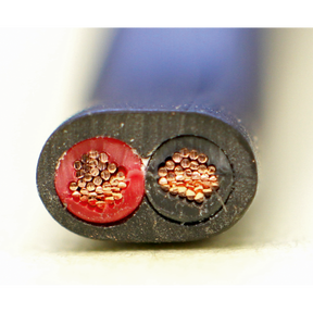 Close-up of the cross-section of Sealey's Automotive Cable Thick Wall Flat Twin 2 x 1mm² 14/0.30mm 30m Black - AC1430TWTK, featuring one red insulated wire and one black insulated wire, both composed of multiple copper strands. This RoHS Compliant product ensures reliable performance in automotive applications.