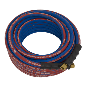 A Sealey Air Hose 15m x Ø10mm with 1/4"BSP Unions Extra-Heavy-Duty - AH15R/38, featuring a coiled red and blue design, two brass fittings, black connectors at the ends, and a protective wrap.