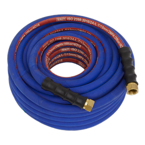 The Sealey Air Hose 20m x Ø13mm with 1/2"BSP Unions Extra-Heavy-Duty (AH20R/12) is a coiled blue rubber air hose featuring black and brass fittings. The Sealey branding and specifications are printed in white and red text along its length. This silicone-free hose is designed for enhanced durability with the inclusion of bend restrictors.