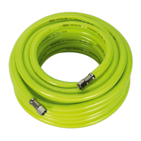 A high-visibility coiled yellow hose branded as Sealey, measuring 15 meters by Ø8mm and fitted with 1/4" BSP unions at both ends, features a reinforced PVC outer coating. This product is the Air Hose High-Visibility 15m x Ø8mm with 1/4"BSP Unions - AHFC15.