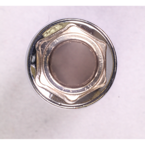 Top view of a shiny metal hex nut in Sealey's Socket Set 12pc 3/8"Sq Drive WallDrive® Metric - AK2693 configuration against a plain background.