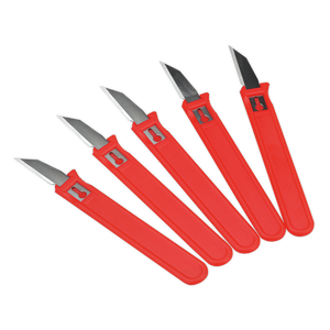 Five Trim Knives from Sealey (Pack of 5, AK2963) with red handles, short, sharp metal blades, and safety covers arranged in a fan-like pattern.