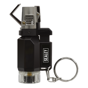 Introducing the Heating Torch Butane Micro – AK4041 by Sealey, a compact butane-powered metal torch lighter with a keychain attachment. It features a piezoelectric ignition lever and a clear base that reveals the fuel chamber, making it an ideal addition to your hand tools collection.