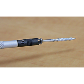 Close-up of a Sealey Screw Starter Double End - AK4318 gripping a screw, against a plain background.