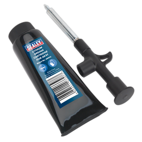 The Sealey Mini Grease Applicator 100g - AK51 and its matching black cartridge with a blue label ensure precision application. The grease applicator features a plunger and metal nozzle for accurate dispensing of the lithium grease.