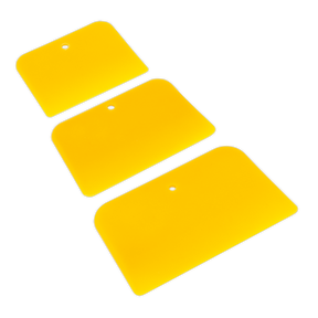 The Body Filler Applicator Set 3pc - AK5225 by Sealey includes three yellow, rectangular applicators with rounded edges and black borders. Each applicator features a hole near the edge for easy hanging and comes in different widths to accommodate various needs.