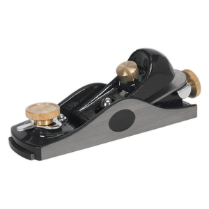 The Sealey Block Plane - AK6092 is a fully adjustable hand planer tool with a cast iron body and a carbon steel cutting blade, featuring adjustment knobs for precision smoothing of wood surfaces.