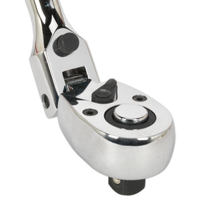 Close-up of a Premier Hand Tools chrome double-braced kick drum pedal hinge, showcasing its mechanical components and shiny metallic surface, much like the precision of Sealey's Ratchet Wrench Flexi-Head Extra-Long 600mm 1/2" Sq Drive - AK6698.