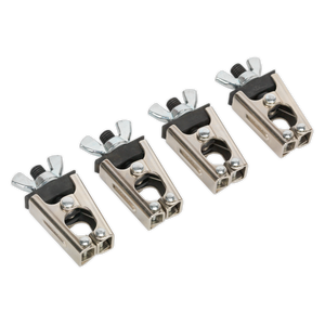 The Sealey Micro Welding Clamp Set 4pc - AK6804 includes four metal wing-nut clamps arranged in a row, specifically designed for securing objects. Each micro clamp features a screw mechanism and dual openings, providing versatile clamping applications that make them ideal for automotive or welding tasks.