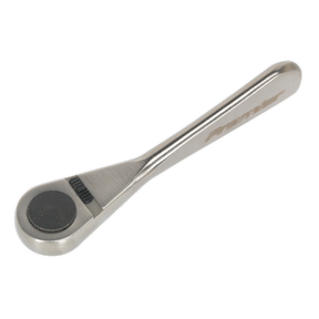 The Ratchet Wrench Micro 1/4"Sq Drive Stainless Steel - AK6960 from Sealey features a sleek, slim handle and a black circular head made with high-quality stainless steel, delivering an ultra-smooth ratchet experience.