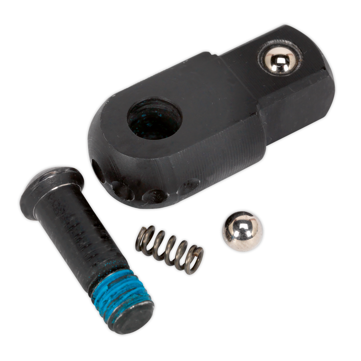 A close-up image showcasing a disassembled mechanical component: the Knuckle 1/2"Sq Drive for AK7303 - AK7303RK by Sealey, featuring a black metal part with a large hole, a black bolt with blue marking, and a small spring alongside a metal ball bearing. Premier Hand Tools ensure precision in every piece.