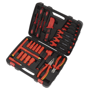 A black and red tool case from Sealey, featuring the 1000V Insulated Tool Kit 27pc - VDE Approved (AK7945), contains various insulated tools, including pliers, wrenches, and screwdrivers made of durable Chrome Vanadium steel, all neatly organized within designated slots.