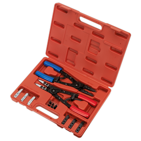 The Sealey Circlip Pliers Set Internal/External 265mm Heavy-Duty - AK8500 comes in a red plastic case, containing both internal and external circlip pliers with blue and red handles. The set includes several metal attachments organized neatly in designated slots, and features a spring ratchet locking mechanism for precise positioning and secure use.