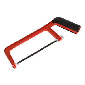 A Sealey Junior Hacksaw with Adjustable Blade 150mm - AK8680, featuring a red and black design, a metal blade, and a plastic handle with a rigid die-cast aluminium frame, isolated on a white background.