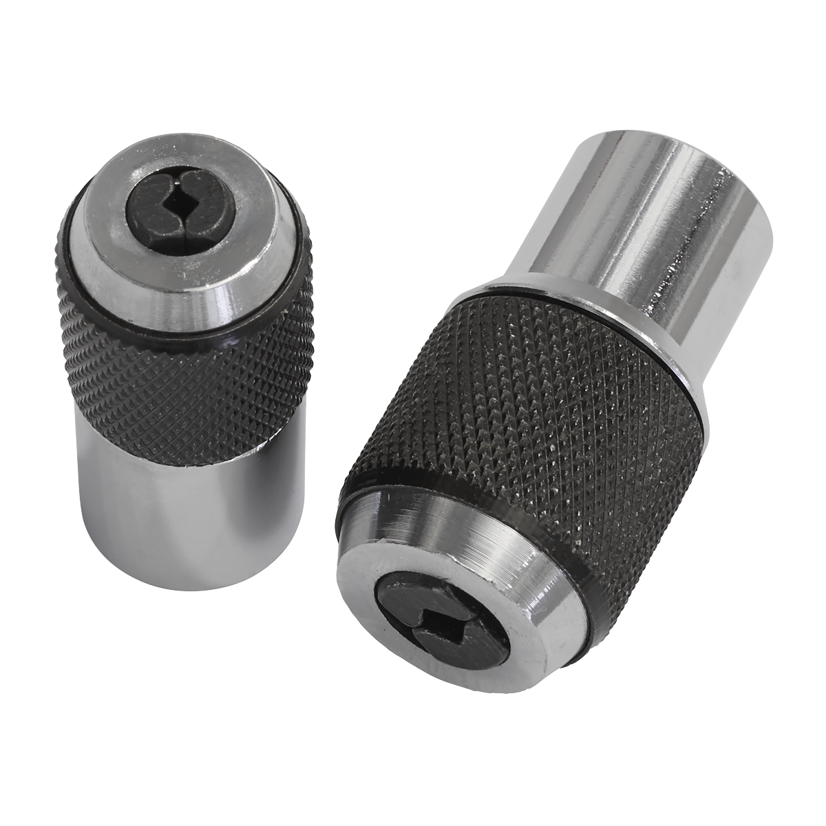 Two cylindrical metallic chucks with knurled grips, one standing upright and the other lying on its side, designed for accurate tapping in tight spaces. They are part of the Sealey Adjustable Tap Socket Set 2pc - AK872.