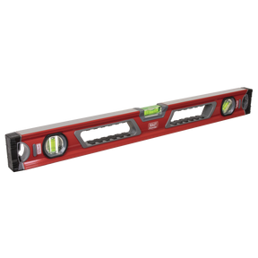 The Sealey Spirit Level 600mm - AK9866 is a red and black tool that features an aluminium box beam design, two handles, and three shockproof bubble vials for precise horizontal and vertical measurements.