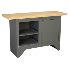The Sealey Workbench with Cupboard Heavy-Duty - AP2010 features a wood laminate top, a gray metal frame, two open shelves on the left, and a lockable cupboard with steel panels and a door on the right.