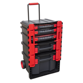 The Sealey Professional Mobile Toolbox with 5 Removable Storage Cases - AP860 features a sleek black and red design, equipped with multiple drawers and compartments, a retractable handle, and wheels for easy mobility. This mobile toolbox ensures all your tools are organized and readily accessible wherever you go.