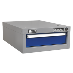 A Sealey Single Drawer Unit for API Series Workbenches (API14) featuring a gray metal frame with a slim-width blue drawer, heavy-duty slides, and a lock on the top right, perfect for an industrial workbench.