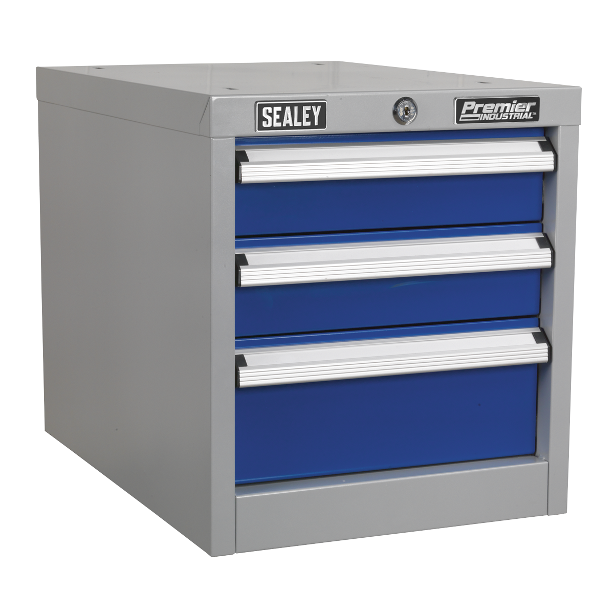 The "Sealey Industrial Triple Drawer Unit for API Series Workbenches - API16" is a gray metal toolbox featuring three blue drawers with heavy-duty drawer slides and a lockable top, ideal for an industrial workbench setting.