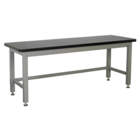 The Sealey Workbench Steel Industrial 2.1m - API2100 is a rectangular metal workbench with a dark laminate worktop and sturdy legs, designed for industrial or workshop use. Made from heavy gauge steel, it features adjustable feet for stability on uneven surfaces.