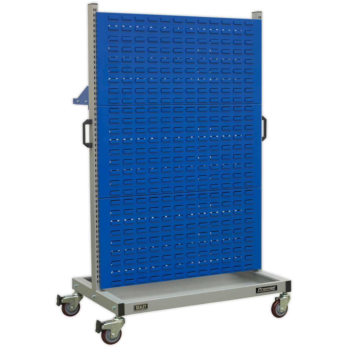 The Sealey Industrial Mobile Storage System with Shelf - APICCOMBO1 features a blue pegboard back with multiple rows of small rectangular holes, four heavy-duty castors, side handles, and a bottom shelf. It is the perfect tool storage solution for any workspace.