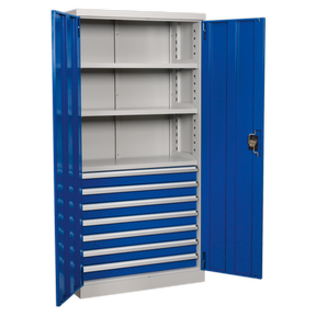 The Sealey Industrial Cabinet 7 Drawer 3 Shelf 1800mm - APICCOMBO7 is a freestanding unit in blue and gray metal, featuring two open doors, three adjustable shelves, and six drawers with heavy-duty slides.