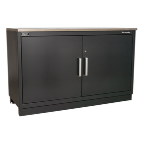 The Sealey "Modular Floor Cabinet 2 Door 1550mm Heavy-Duty - APMS02" is a versatile black metal storage cabinet featuring silver handles and a flat top surface. Constructed from durable steel, it includes an adjustable shelf for customizable storage space, making it perfect for any garage storage system.