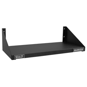 A black wall-mounted steel shelf, product name "Modular Shelf - APMS70," with a tough and durable hammered metal finish, featuring the brand name "Sealey" visible on the front. The shelf has a flat surface and two mounting brackets on the sides.
