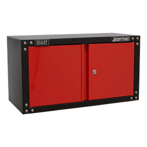 A Sealey Modular 2 Door Wall Cabinet 665mm - APMS85 in red and black, featuring a metal construction with two doors, a central lock, and self-assembly capabilities, is ideal for tool storage.